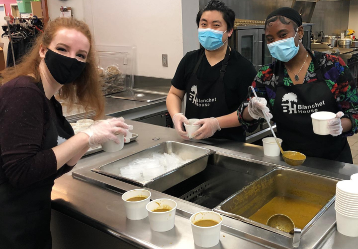 Our volunteers serving meals at blanchet house 
