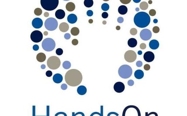 Hands On Greater Portland logo, featuring the outline of a hand surrounded by many blue and grey dots