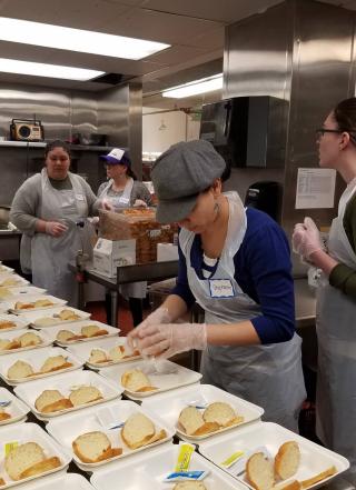 Students helping meal prep