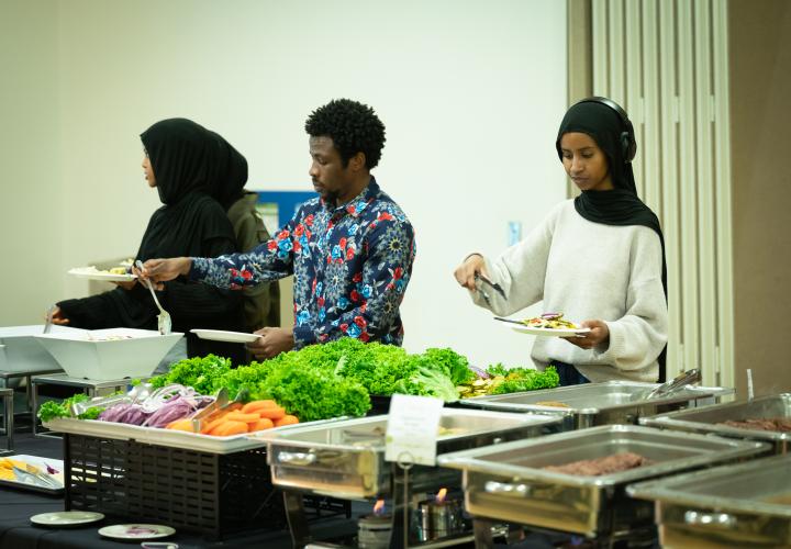 Students in the food line at an event in the SMSU Ballroom