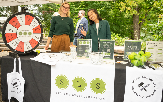 PSU Student Legal Services staff at their Party in the Park table