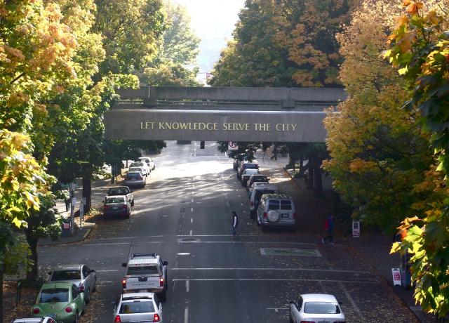 Let Knowledge Serve the City Sign