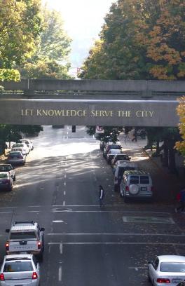 Let Knowledge Serve the City Sign