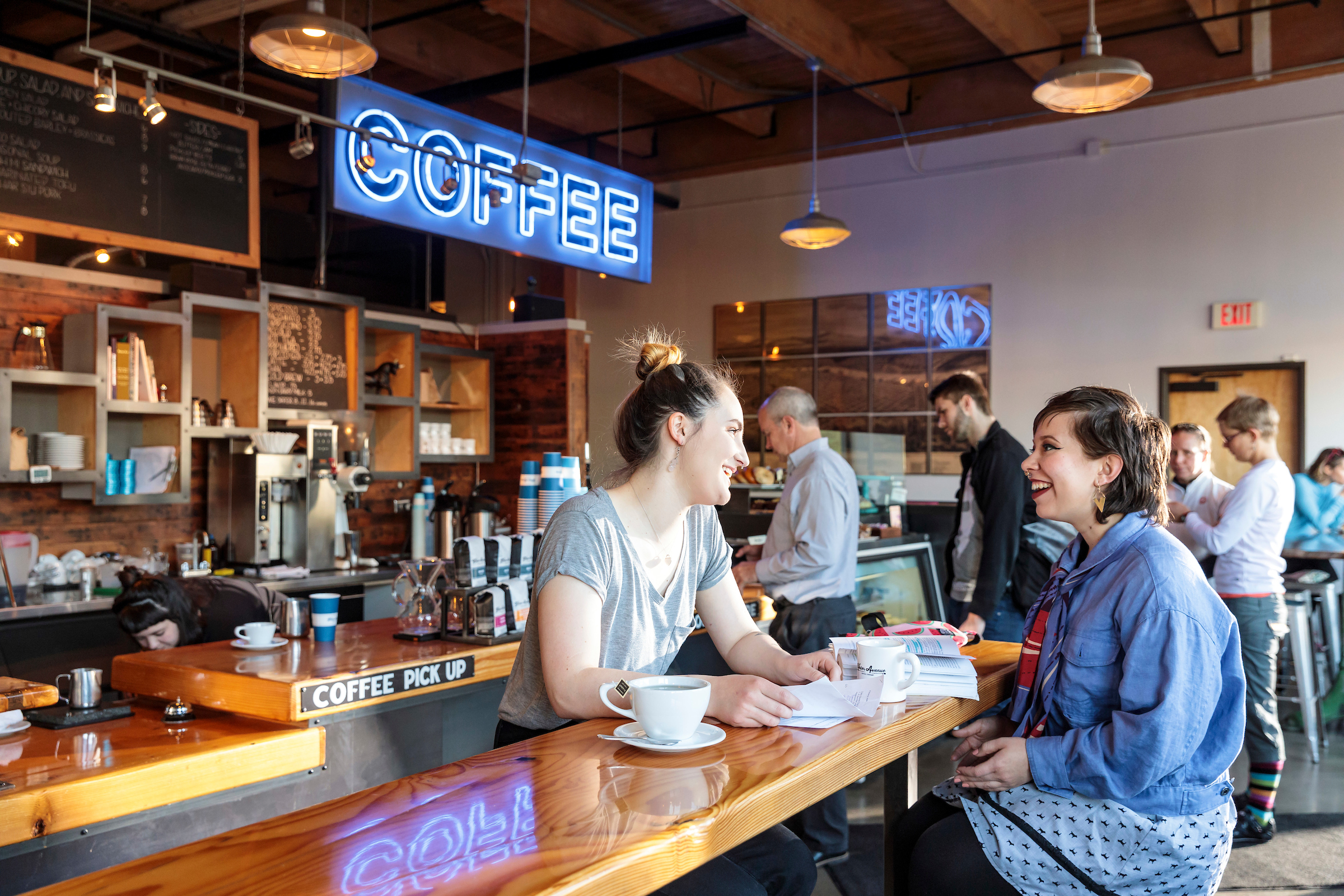 two female students enjoying coffee