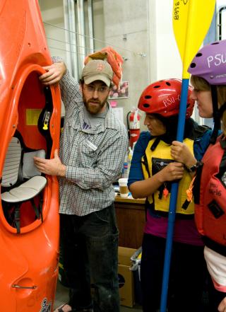 Students scope out a kayak