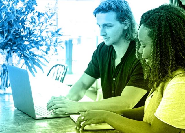 People working together on a laptop