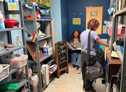 A person looking at donated items inside the Reuse Room