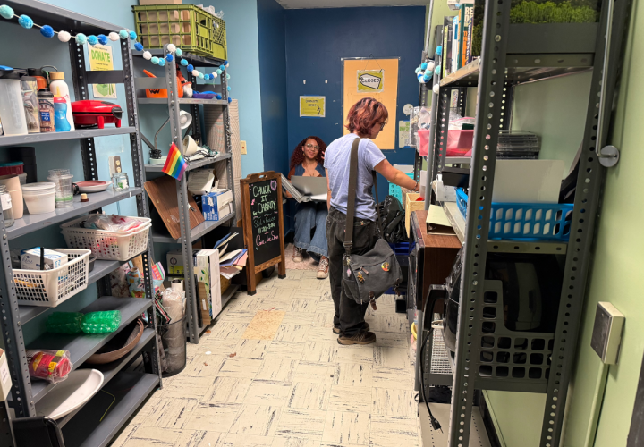 A person looking at donated items inside the Reuse Room