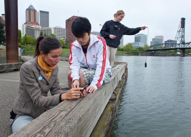 Students collecting samples from the Willamette River