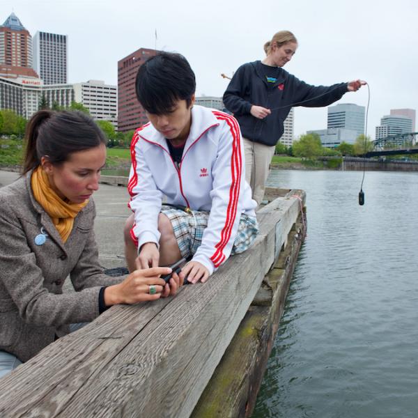 Students collecting samples from the Willamette River