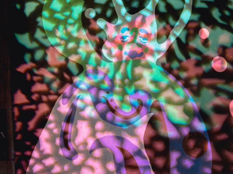 A mural with lighting project onto it
