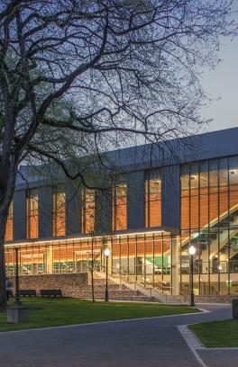 glass fronted building illuminated by light