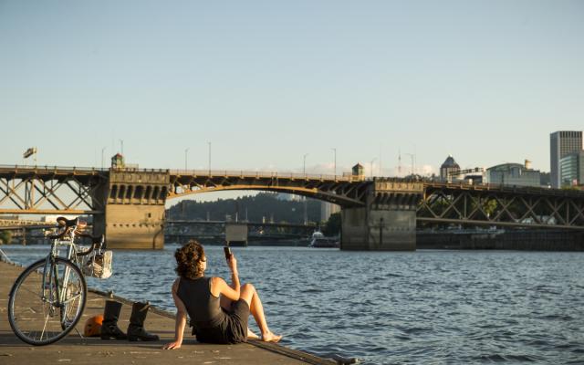 Person on bank of Willamette River