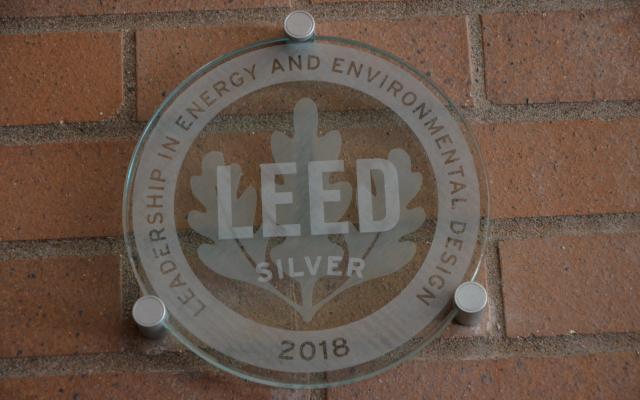 Leadership in energy and environmental design plaque for silver designation