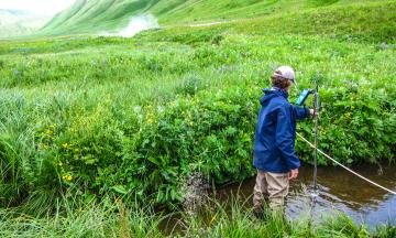 USGS Researchers Measuring Steam Discharge at Akutan Volcano in Alaska