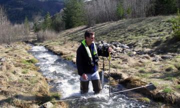 USGS Hydrologist Greg Clark measures streamflow on Government Gulch Creek