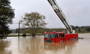 Flooding from the Salmon River in Otis, Oregon, on Nov. 12, 2021. (Kristyna Wentz-Graff / OPB)