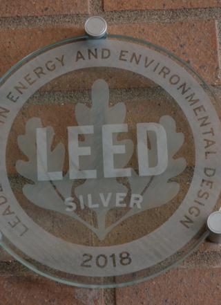 Leadership in energy and environmental design plaque for silver designation