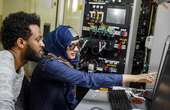 Student working on computer in an engineering lab