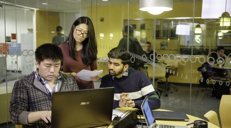 Students in a computer lab working
