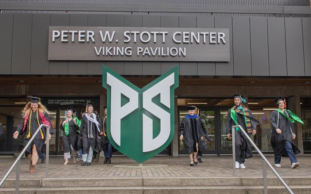 Graduates exit PSU’s Viking Pavilion at Peter W. Stott Center