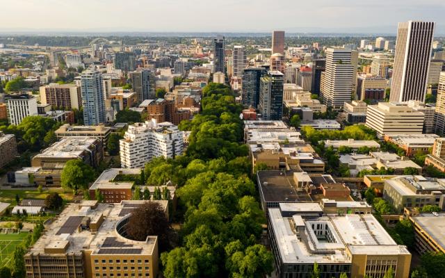 Aerial view of downtown Portland with Portland State University’s Park Blocks in the foreground