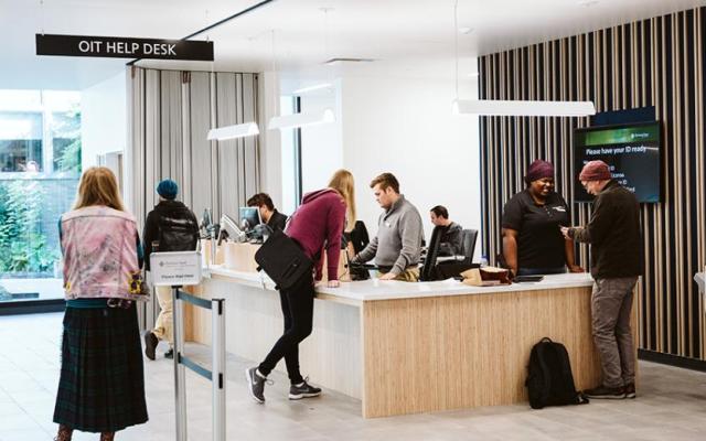 PSU OIT Help Desk staff assisting students