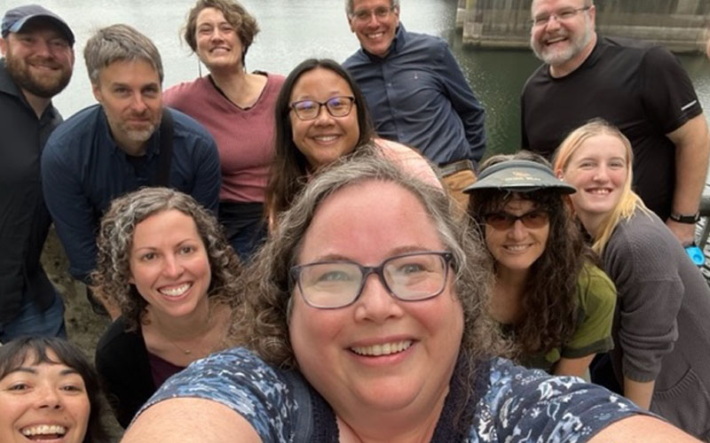 OIT employees taking a group picture after walking together