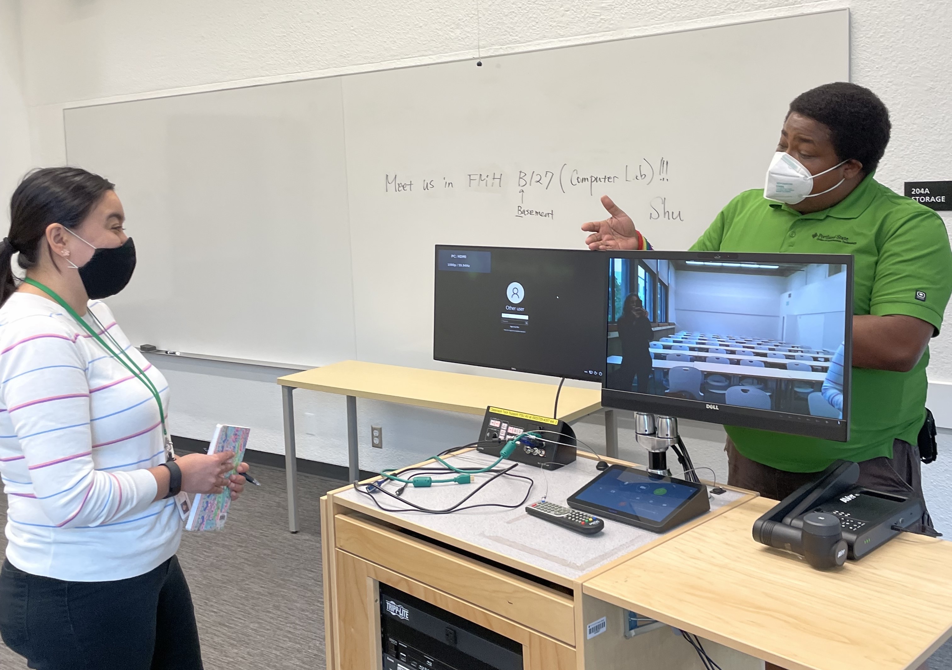 OIT staff employee providing training for Fall Surge support