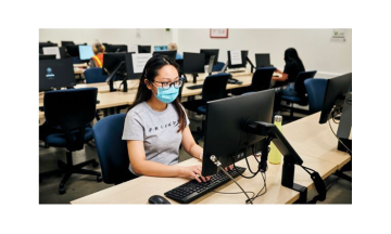 Student working on computer in OIT Computer Lab