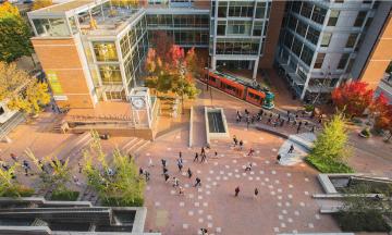 an aerial view of the urban plaza building center