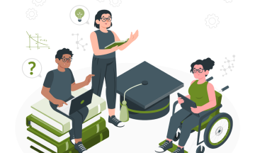 Three students using technology with one in a wheelchair sitting amongst books