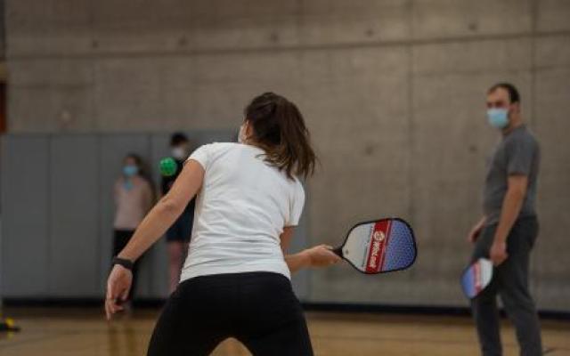 Picture of person playing pickleball.