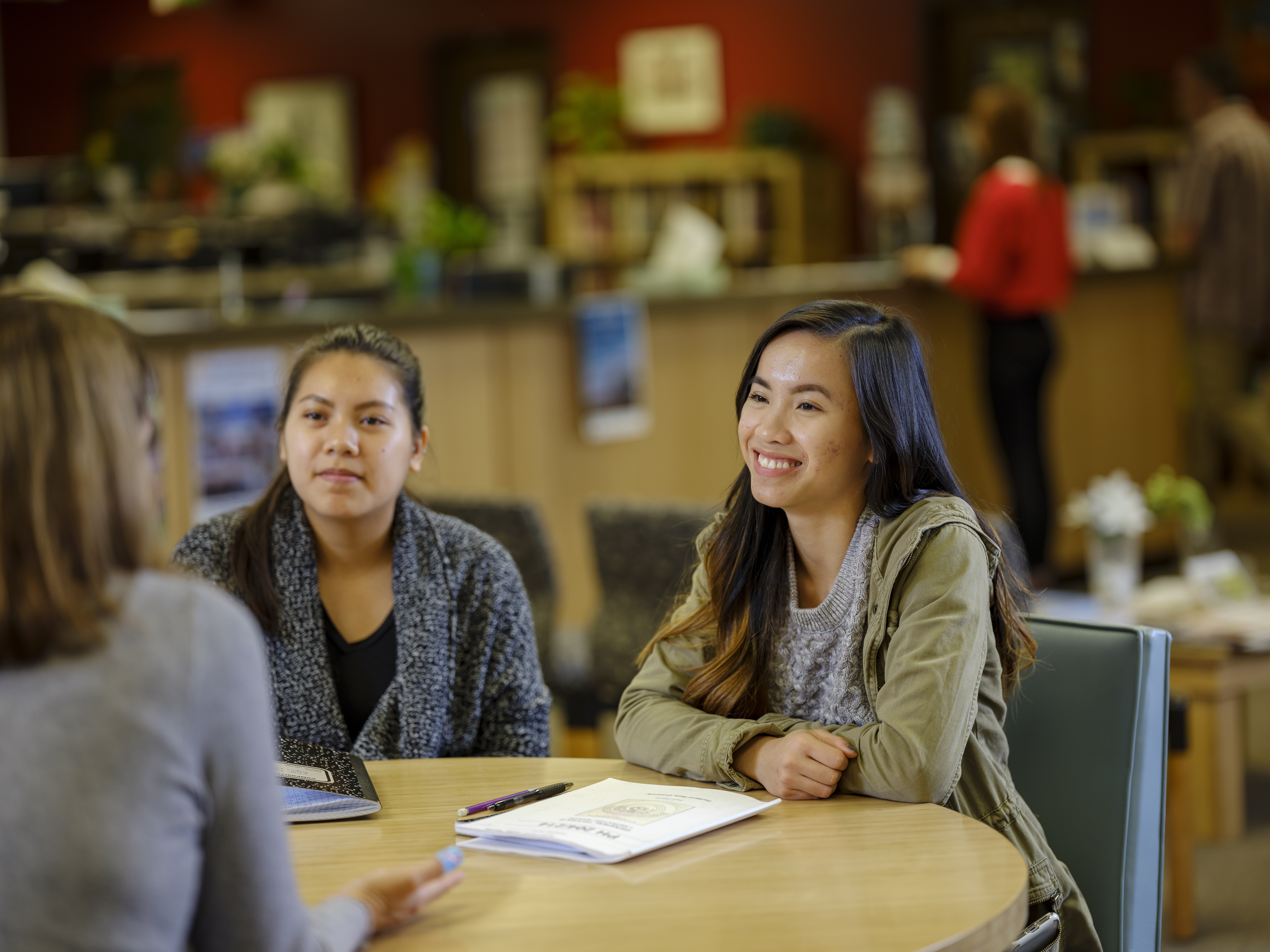 Students meeting with an advisor