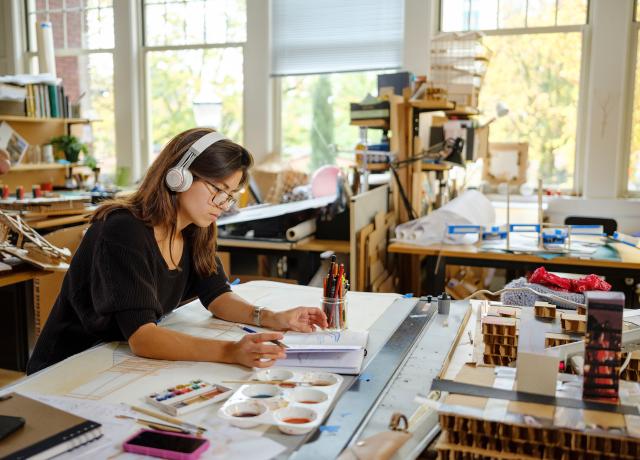 Image of artist painting.