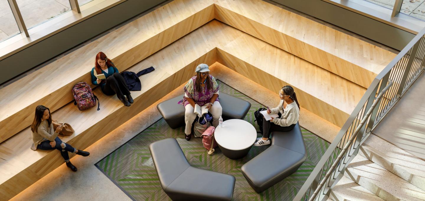 four students in social lounge