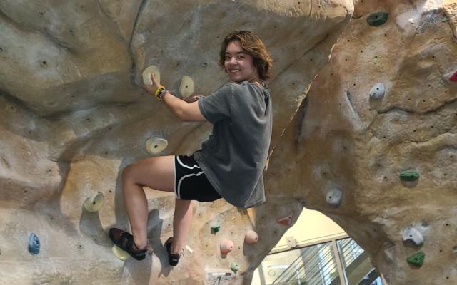 Image of student climbing.
