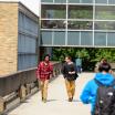 several students crossing one of PSU's sky bridges between buildings