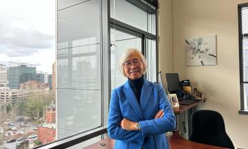 Dean Wong at her desk