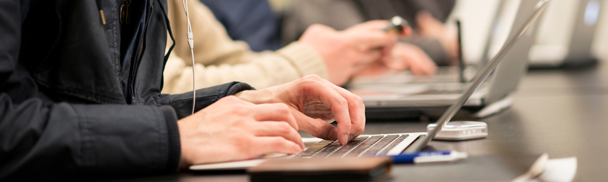 Portland State students working on their laptops