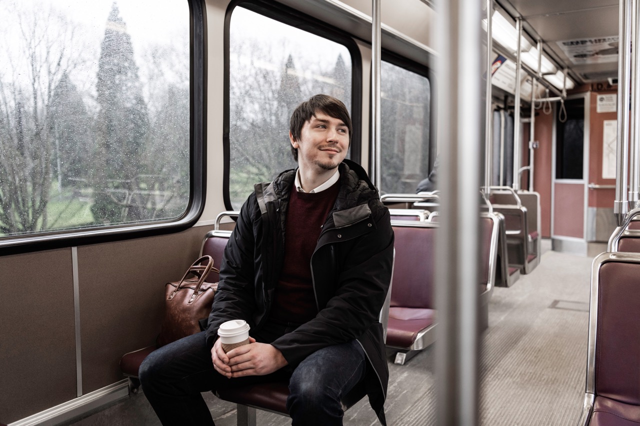 Student riding train