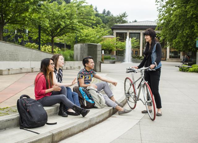 Group of PSU students socializing on the Walk of Heroines