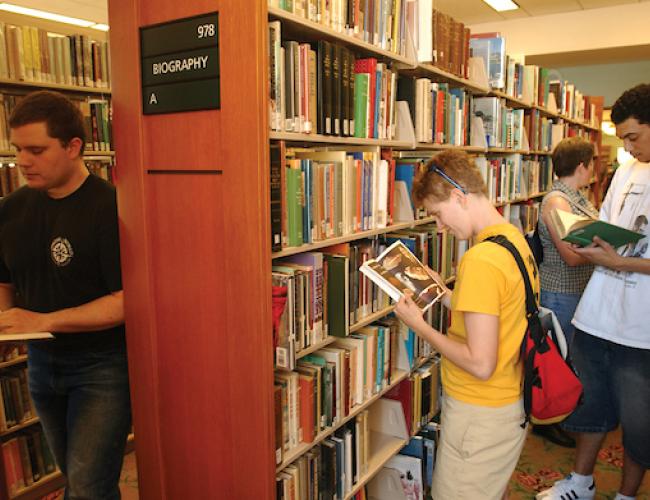 Students in Library Stacks