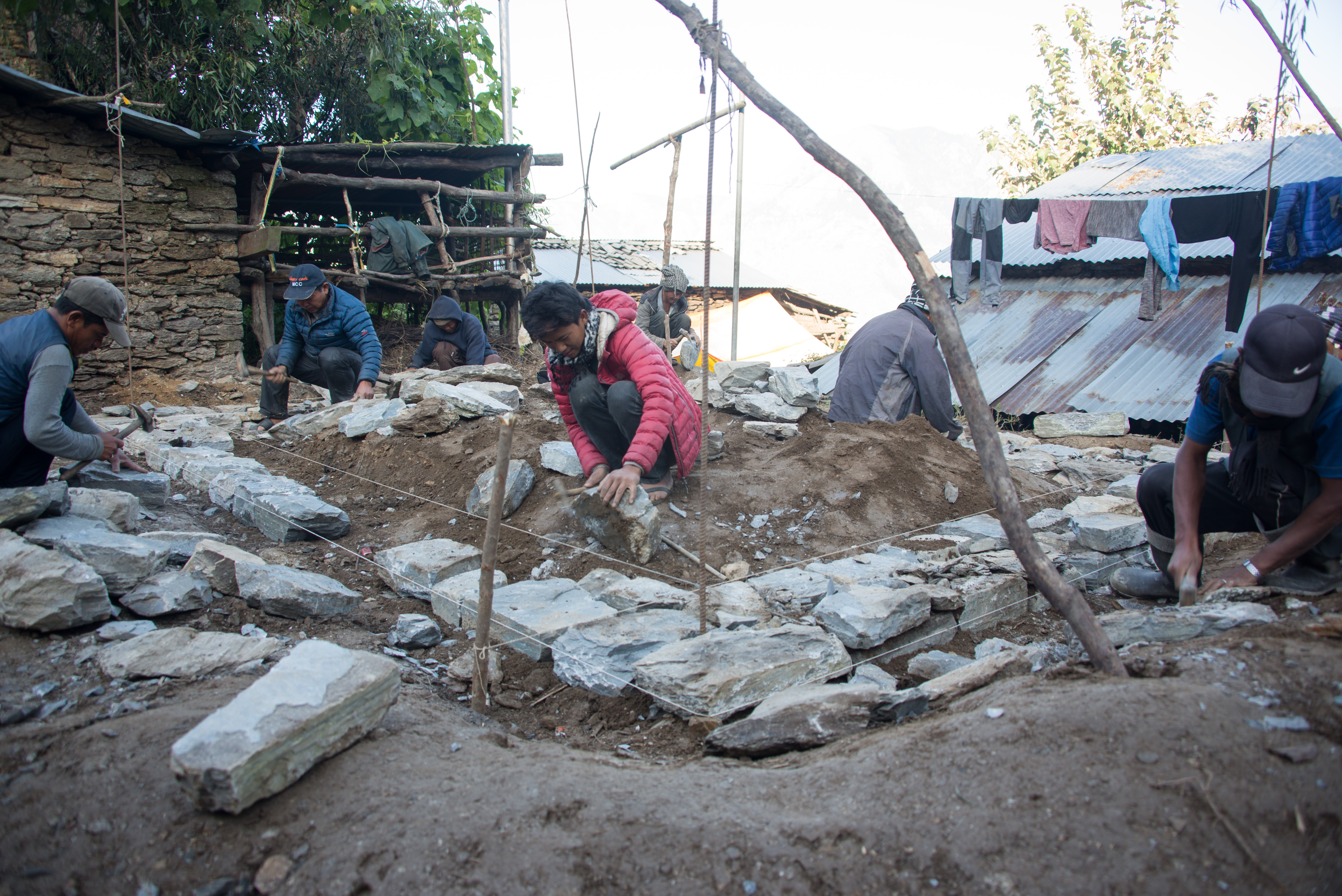 People rebuilding homes