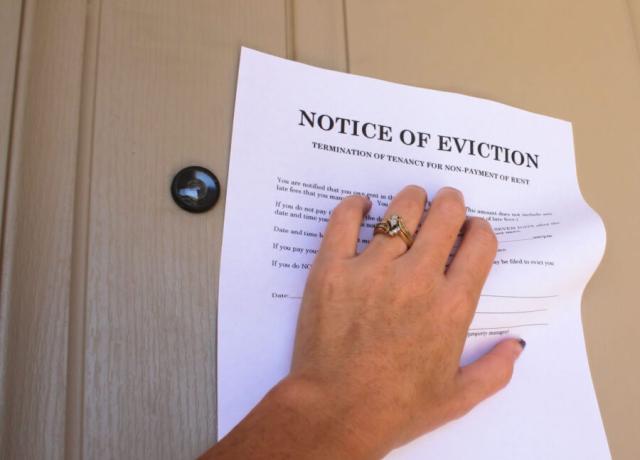 Door with eviction notice