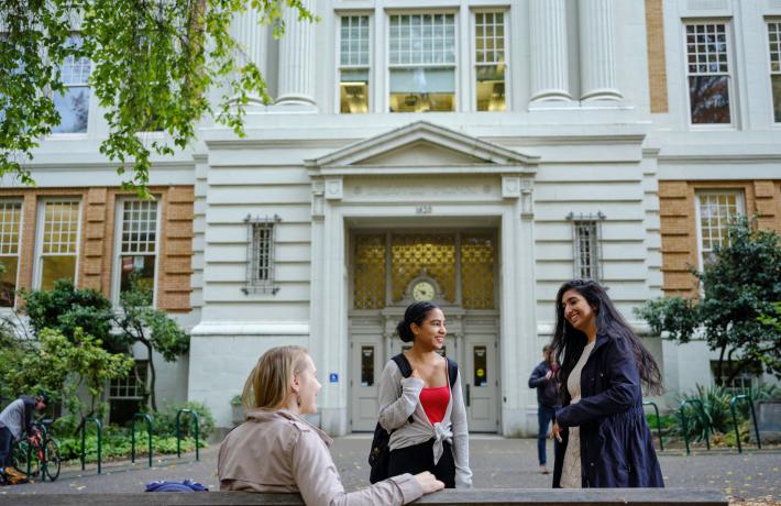 Students in front of campus building