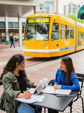 Women in Urban Plaza