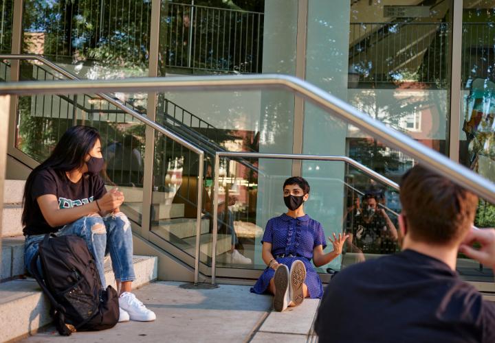 Students on campus in masks