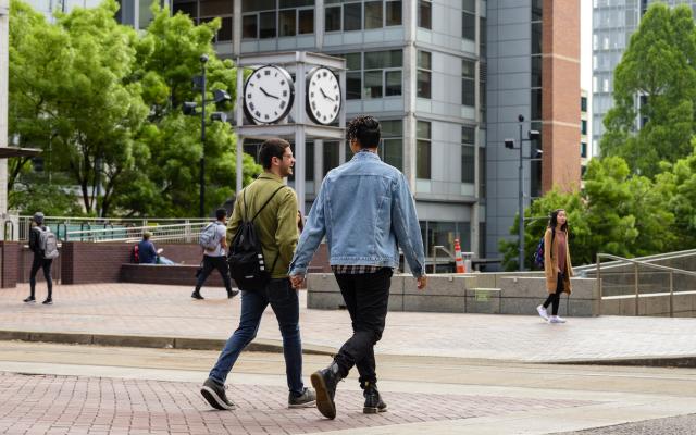 Students walking toward Urban Plaza