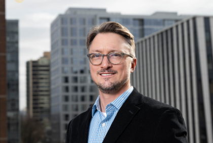 smaller image of greg schrock